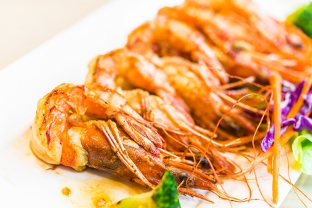 Steak shrimps in white plate - japanese style food - selective focusの写真素材