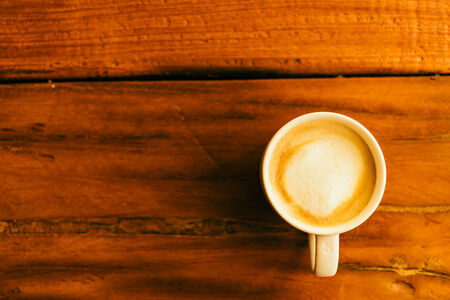 Latte Coffee cup in coffee shop - Vintage Retro effect style picturesの写真素材