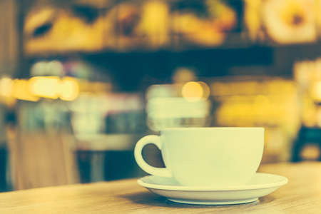 Coffee cup in coffee shop - vintage effect style picturesの写真素材