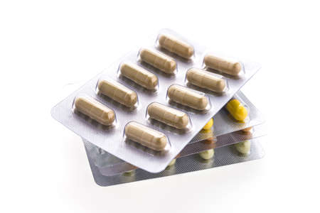 Capsule pill isolated on white backgroundの写真素材