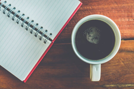 Coffee cup with note book - Vintage effect style picturesの写真素材