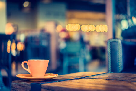 Coffee mug in coffee shop cafe - Vintage effect style picturesの写真素材