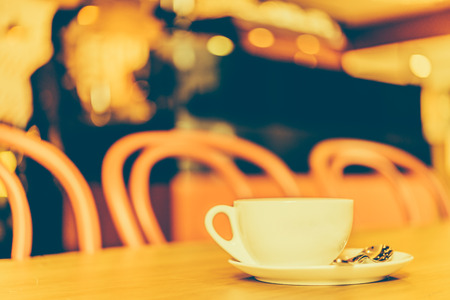 Coffee cup in coffee shop - vintage effect style picturesの写真素材