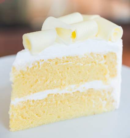 White chocolate cake in white plate - close up selective shotの写真素材