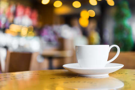 Coffee cup on wooden table - Vintage effect style picturesの写真素材