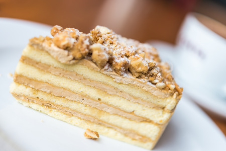 Coffee cakes on white plate - selective focus point