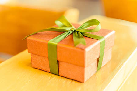 Christmas Gift box on wooden background - Vintage effect style picturesの写真素材