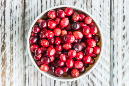 Cranberry on wooden backgroundの写真素材