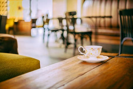 Coffee cup in coffee shop - vintage effect style picturesの写真素材