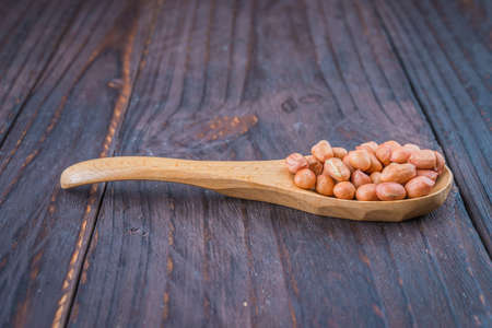 Peanut on wooden background - vintage effect style picturesの写真素材