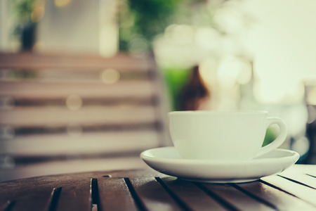 Latte art coffee cup in white mug - vintage effect style picturesの写真素材