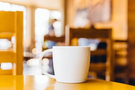Coffee cup in coffee shop - vintage effectの写真素材