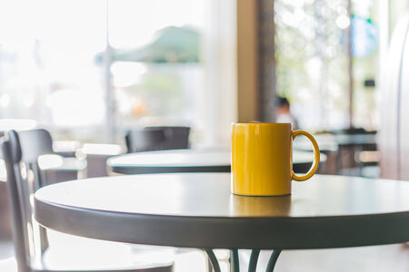 Coffee cup in coffee shop - vintage effect style picturesの写真素材