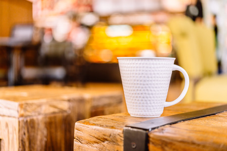 Coffee mug in coffee shop - vintage effect style picturesの写真素材