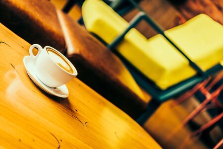 Latte Coffee cup in coffee shop - Vintage Retro effect style picturesの写真素材