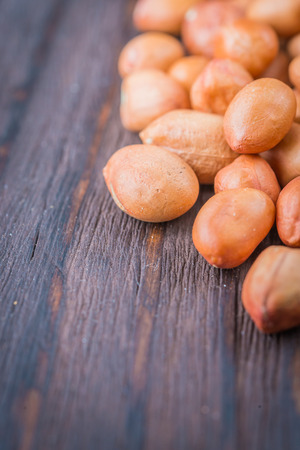 Peanut on wooden background - vintage effect style picturesの写真素材