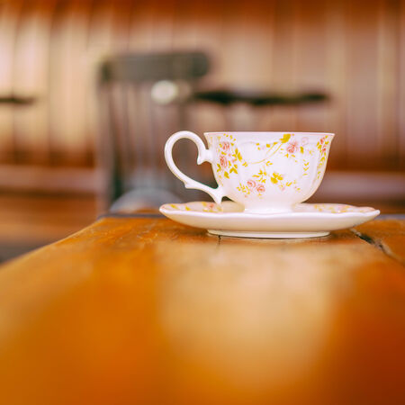 Coffee cup in coffee shop - vintage effect style picturesの写真素材