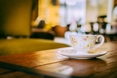 Coffee cup in coffee shop - vintage effect style picturesの写真素材