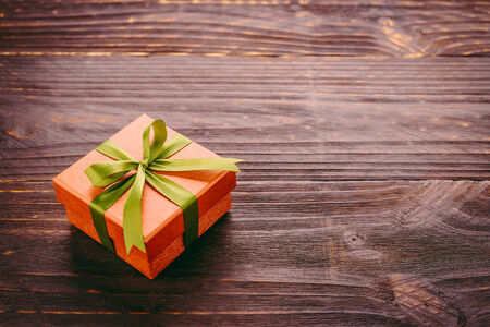 Gift box on wooden background - Vintage effect style picturesの写真素材