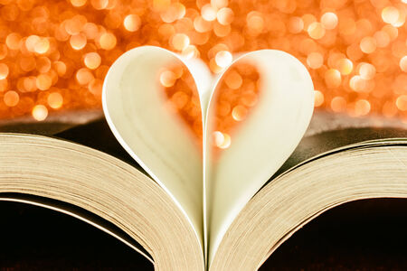 Book heart shape on bokeh background - vintage effect styleの写真素材