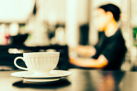 Black coffee in white cup in coffee shop - Vintage effect pictures styleの写真素材