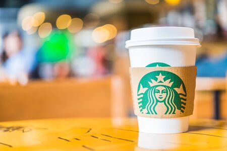 Bangkok ,Thailand- OCT 30 : Hot coffee cup Blended Beverages served at wood table in starbuck shop at Central Department store Rattatibet , Bangkok, Thailand.のeditorial素材