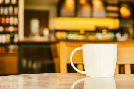 Coffee cup in coffee shop - vintage effect picturesの写真素材