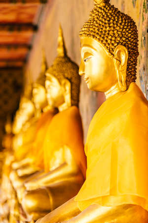 Selective focus point on Buddha statue in wat arun from thailand bangkok - vintage effect style picturesの写真素材