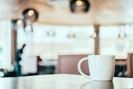 Coffee cup in coffee shop - vintage effect style picturesの写真素材