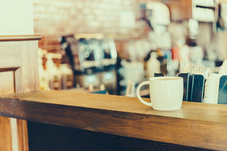 latte coffee in white cup - vintage effect style picturesの写真素材