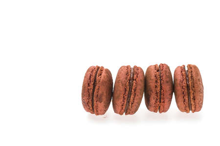 Chocolate macaroon isolated on white backgroundの写真素材