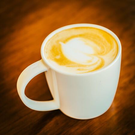 Coffee cup in coffee shop - vintage effect style picturesの写真素材