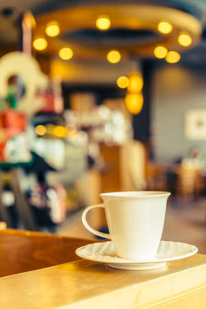Coffee mug in coffee shop - Vintage effect style picturesの写真素材