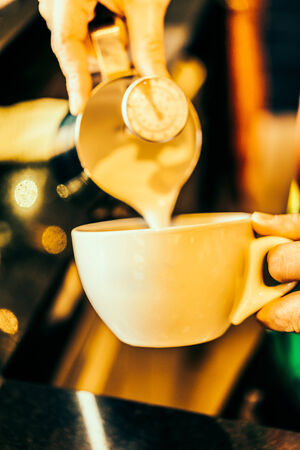Making latte art coffee cup - Vintage effect style picturesの写真素材