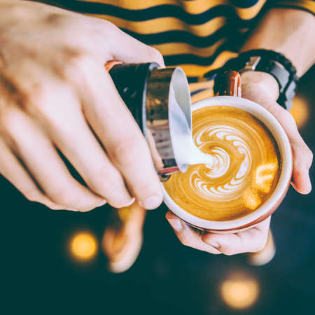 Latte art coffee cup - vintage effectの写真素材