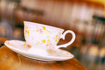 Coffee cup in coffee shop - vintage effect style picture