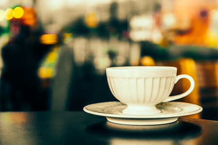 Black coffee in white cup in coffee shop - Vintage effect pictures styleの写真素材