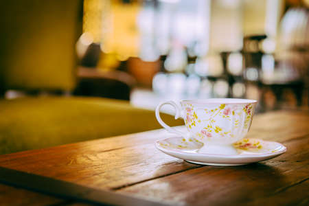 Coffee cup in coffee shop - vintage effect style picturesの写真素材