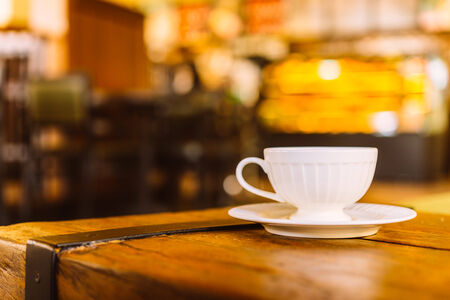 Coffee cup in coffee shop - vintage effect style picturesの写真素材