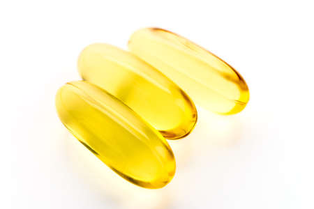 Fish oil isolated on white backgroundの写真素材