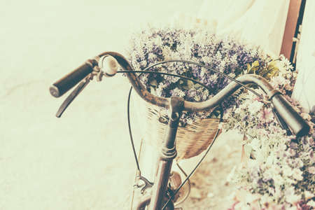Vintage bicycle with flower - vintage effect filter style picturesの写真素材