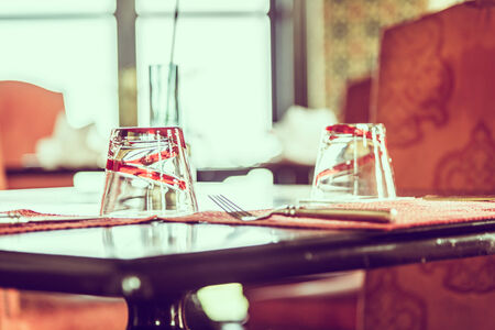Selective focus point on glass in restaurant - vintage effect style picturesの写真素材