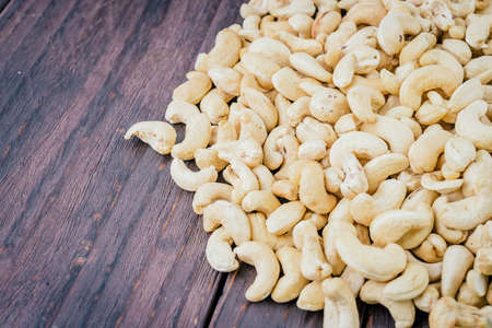 Cashew on wooden backgroundの写真素材