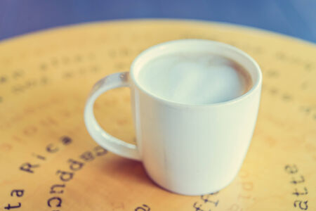 Coffee cup in coffee shop - vintage effect style picturesの写真素材