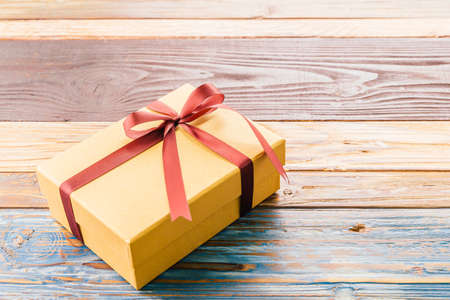 Gift box on wood background - vintage effect style picturesの写真素材