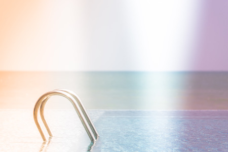 Pool staircase - vintage effect and light leak filter processingの写真素材