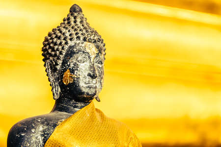 Selective focus point on Buddha statue in wat arun from thailand bangkok - vintage effect style picturesの写真素材