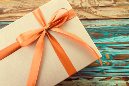 Gift box on wooden background - vintage effect style picturesの写真素材