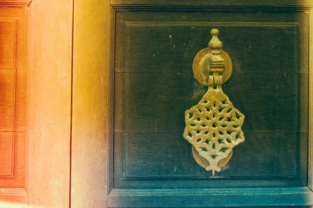 Door knob - vintage effect and light leak filter processingの写真素材