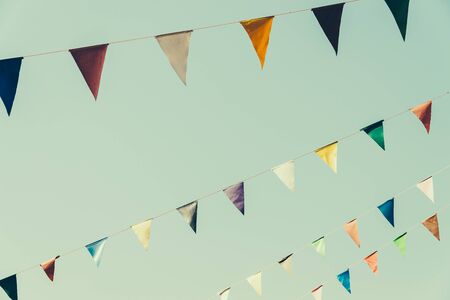 Colorful flag on blue sky - vintage effect style pictures